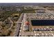 Aerial view showcasing a single-Gathering home in a residential neighborhood at 5462 Logan Cave Ave, Wimauma, FL 33598