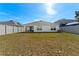 Spacious backyard with fenced perimeter at 5462 Logan Cave Ave, Wimauma, FL 33598