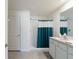Clean bathroom with shower/tub combo and vanity at 5462 Logan Cave Ave, Wimauma, FL 33598