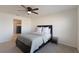 Guest bedroom with full bed and en-suite bathroom at 5462 Logan Cave Ave, Wimauma, FL 33598