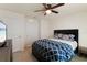 Bedroom with full bed, ceiling fan and dresser at 5462 Logan Cave Ave, Wimauma, FL 33598