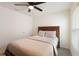 Cozy bedroom with a double bed and neutral decor at 5462 Logan Cave Ave, Wimauma, FL 33598