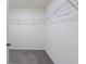 Large walk-in closet with wire shelving for storage at 5462 Logan Cave Ave, Wimauma, FL 33598