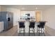 Modern kitchen with stainless steel appliances and granite countertops at 5462 Logan Cave Ave, Wimauma, FL 33598