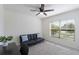 Home office with desk, chair, and sleeper sofa at 5462 Logan Cave Ave, Wimauma, FL 33598