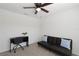 Home office with desk, chair, and sleeper sofa at 5462 Logan Cave Ave, Wimauma, FL 33598