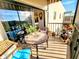 Spacious balcony with seating and lake view at 6188 80Th N St # 402, St Petersburg, FL 33709