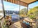 Relaxing screened balcony overlooking a lake with a fountain at 6188 80Th N St # 402, St Petersburg, FL 33709