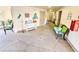 Building lobby with seating, art, and fire extinguisher at 6188 80Th N St # 402, St Petersburg, FL 33709