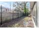 Small backyard with wooden fence at 6333 Osprey Lake Cir, Riverview, FL 33578