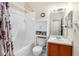 Bathroom with shower/tub combo and wood vanity at 6333 Osprey Lake Cir, Riverview, FL 33578