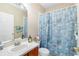 Bathroom with seashell-themed shower curtain at 6333 Osprey Lake Cir, Riverview, FL 33578