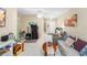 Living room with comfortable seating and access to other rooms at 6333 Osprey Lake Cir, Riverview, FL 33578