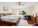 Large main bedroom with a king-size bed and ample space at 6333 Osprey Lake Cir, Riverview, FL 33578