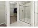 Bathroom with shower and walk-in closet at 6658 Dutton Dr, Wesley Chapel, FL 33545