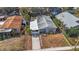 Aerial view of a house with a gray roof at 6811 S Hesperides St, Tampa, FL 33616