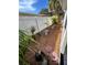 Landscaped backyard with wood chips and bird bath at 6811 S Hesperides St, Tampa, FL 33616