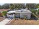 Charming one-story home with a white picket fence at 6811 S Hesperides St, Tampa, FL 33616