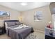 Spacious bedroom with a comfortable bed and nightstands at 6811 S Hesperides St, Tampa, FL 33616