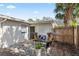 Stone patio with seating area and lush plants at 6811 S Hesperides St, Tampa, FL 33616
