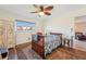 Cozy bedroom with a wooden bed frame and built in storage at 7200 Ulmerton Rd # E3, Largo, FL 33771