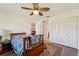 Comfortable guest bedroom with a double bed and ample closet space at 7200 Ulmerton Rd # E3, Largo, FL 33771