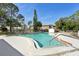 Community pool with lounge chairs at 7200 Ulmerton Rd # E3, Largo, FL 33771