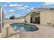 A beautiful pool with a screened in enclosure and brick pavers for easy entertaining at 7320 Newhall Pass Ln, Wesley Chapel, FL 33545