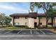 Condo building exterior with reserved parking at 810 S Village N Dr # 201, St Petersburg, FL 33716