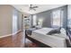 Main bedroom with wood floors, private access to backyard, and ceiling fan at 13029 Haverhill Dr, Spring Hill, FL 34609