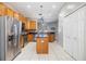 Kitchen boasts stainless steel appliances and an island at 13029 Haverhill Dr, Spring Hill, FL 34609