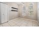 Office with tile floors, built in shelving and closet at 13029 Haverhill Dr, Spring Hill, FL 34609
