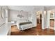 Spacious bedroom with wood floors and access to upper loft at 1866 Michigan Ne Ave, St Petersburg, FL 33703