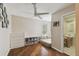 Charming bedroom with wood floors and adjacent bathroom at 1866 Michigan Ne Ave, St Petersburg, FL 33703