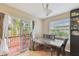 Dining area with table and chairs, access to deck at 1866 Michigan Ne Ave, St Petersburg, FL 33703