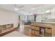 Kitchen with white cabinets, hardwood floors, and island at 1866 Michigan Ne Ave, St Petersburg, FL 33703