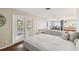 Main bedroom with large TV and access to deck at 1866 Michigan Ne Ave, St Petersburg, FL 33703
