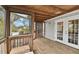 Spacious screened porch with wood flooring and outdoor access at 1866 Michigan Ne Ave, St Petersburg, FL 33703
