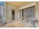 Relaxing balcony with patio furniture and city views at 275 Bayshore Blvd # 408, Tampa, FL 33606
