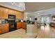 Modern kitchen with wood cabinets and granite countertops at 275 Bayshore Blvd # 408, Tampa, FL 33606