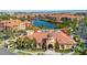 Aerial view of community with pool and clubhouse at 2773 Via Cipriani # 1321B, Clearwater, FL 33764