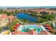 Resort-style pool with plenty of lounge chairs at 2773 Via Cipriani # 1321B, Clearwater, FL 33764