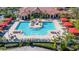 Large community pool with surrounding patio at 2773 Via Cipriani # 1321B, Clearwater, FL 33764
