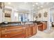 Elegant bathroom with double vanity and large mirror at 2867 Grey Oaks Blvd, Tarpon Springs, FL 34688
