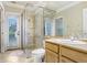 Clean bathroom with a large shower and updated vanity at 2867 Grey Oaks Blvd, Tarpon Springs, FL 34688