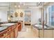 Spa-like bathroom with soaking tub, walk-in shower, and double vanity at 2867 Grey Oaks Blvd, Tarpon Springs, FL 34688