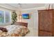 Bedroom with a comfy bed, TV, and ample closet space at 2867 Grey Oaks Blvd, Tarpon Springs, FL 34688