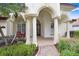 Elegant entryway with columns and a brick walkway at 2867 Grey Oaks Blvd, Tarpon Springs, FL 34688