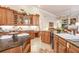 Spacious kitchen with granite countertops and wood cabinets at 2867 Grey Oaks Blvd, Tarpon Springs, FL 34688