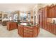 Island kitchen with granite countertops and stainless steel appliances at 2867 Grey Oaks Blvd, Tarpon Springs, FL 34688